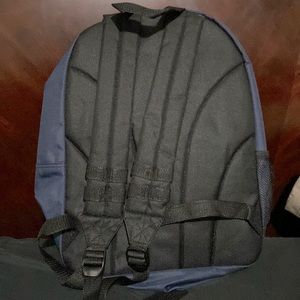 This is a dark deep blue backpack. From the brand Eastswests it’s unisex too.